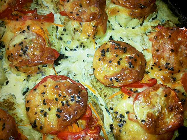 Риба запечена в духовці з овочами і сиром – рецепт з фото